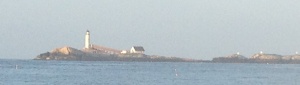 The lighthouse as we leave the Isle of Shoals in the sun.