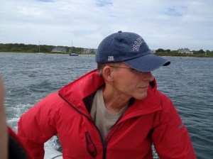 Dinghy captain taking us to town. (Dinghy is the vessel, not a description of the captain.)