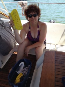 And in my family, what do you do when a sibling comes to visit? Why put them to work, of course!! We took advantage of the water at the dock at the yacht club and did a quick scrub down of the boat . . . she badly needed a bath!!