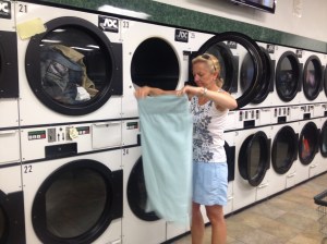 Ems folding the laundry while Frank is walking. JUST KIDDING! He came back in time to help fold. You saw the picture.