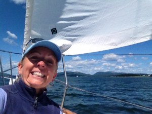Ems up on the bow as we come into Northeast Harbor with Mt. Desert Island in the background. A big moment!!