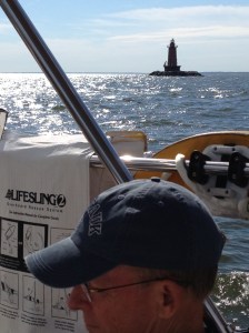 A lighthouse on the way to Sandy Hook . . . Frank finally got to take a breather and let Ems take the wheel for a bit.