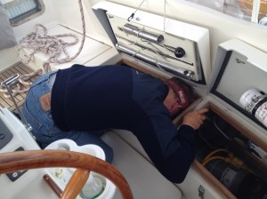 Frank has found that, while I'm at the helm and conditions are calm, he likes to do boat chores. There were OH so many things I could have done to him at this moment, but I resisted the urge . . . 