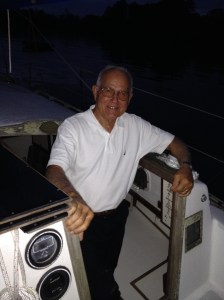 Gil standing in the companionway of Barbara Jean.