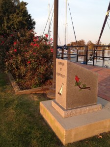 Here is a monument telling the story of the "Rose Buddies" beside the transplanted bed of roses.