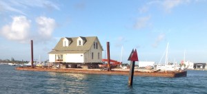 You never know what you'll see. Here's a house on a barge. "What's your address?" "Red 40." 