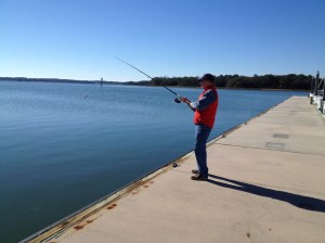 Thanksgiving morning was less windy and brilliantly sunny. After visiting with family by phone, Frank tried some fishing off the marina docks while I prepped some side dishes for our feast with Magnolia. We did not have fish for Thanksgiving.