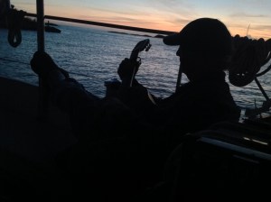 Ron playing at sunset.