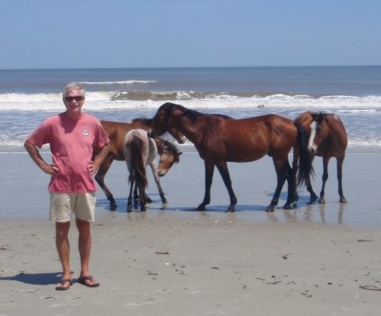 And here Brian is just showing off with the horses on the beach.