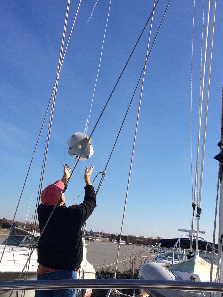 Frank taking down the radar detector.  Eleanor Q has a nice view of the local airport!