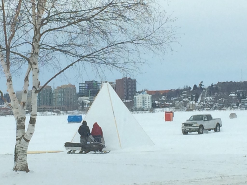 Barrie is a larger city located halfway between us and Toronto - about a 35 minute drive. We explored here one day, stopping by a park on the lake. Yes, that is  the lake. Those are ice fishing huts with the "sleds" or four wheel drive vehicles parked on the ice beside them. I cannot get used to seeing a pickup truck in the middle of the lake. Ice fishing, snowmobiling  and skiing are THE activities. 