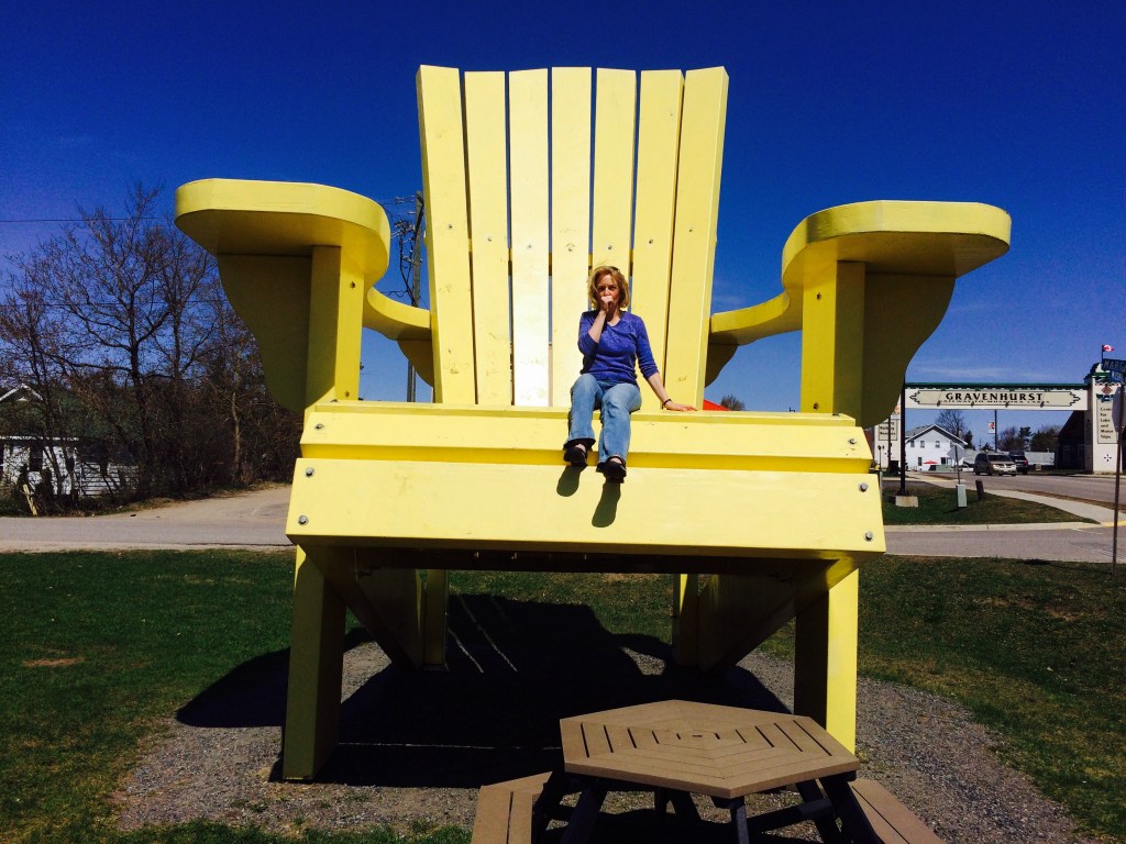 After passing this giant Adirondack chair several times, I had to try sitting in it after the snow had melted off of it! Who remembers Edith Ann from 